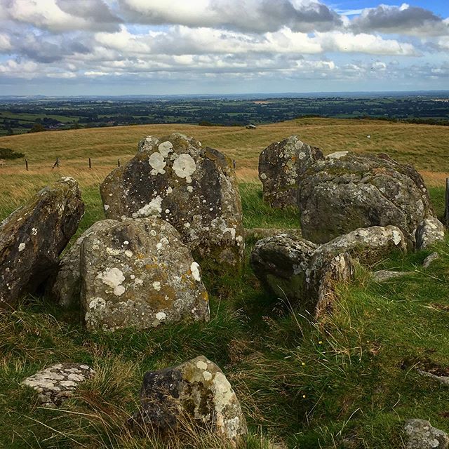 A tomb aligned with a far off Cairn.